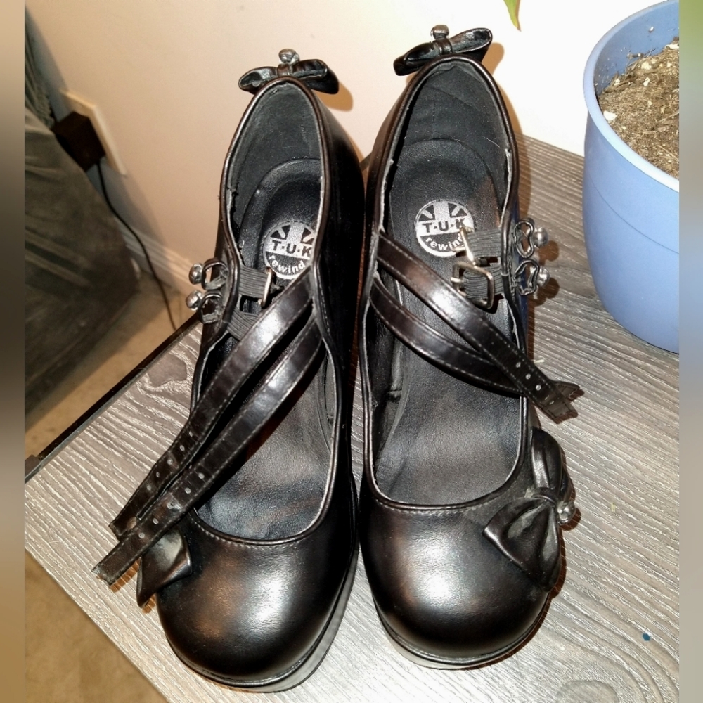 Black T.U.K heels